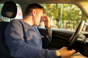 Young Caucasian Driver Falling Asleep Sitting Inside Her Car, Ru