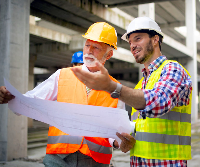 Group Of Construction Engineer Working In Construction Site