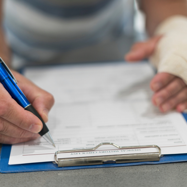 person filling personal injury claim after injury